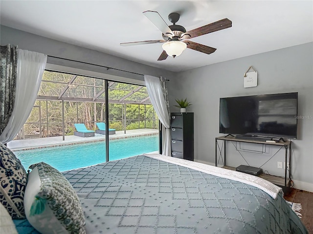 1014 Sylvia Ln, Tampa, FL 33613 - bedroom featuring access to exterior, wood finished floors, and ceiling fan