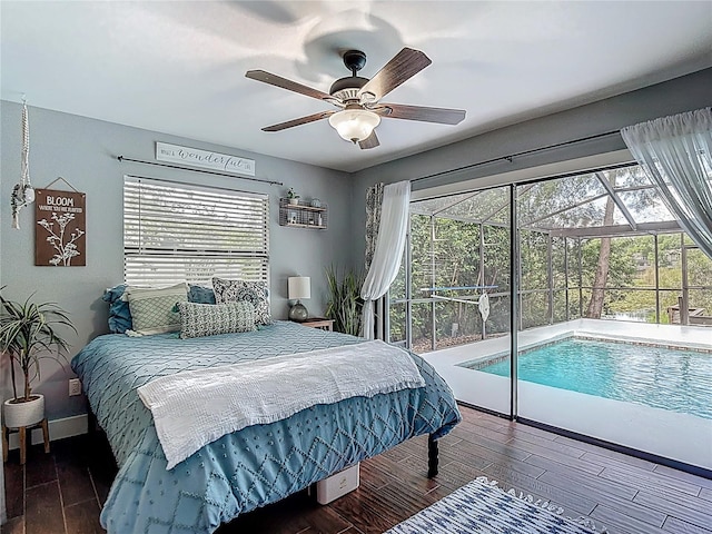 1014 Sylvia Ln, Tampa, FL 33613 - bedroom with wood finished floors, multiple windows, access to exterior, and ceiling fan