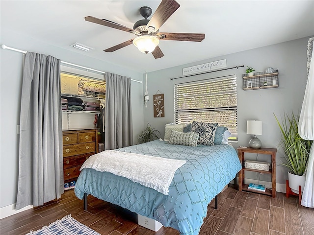 1014 Sylvia Ln, Tampa, FL 33613 - bedroom featuring wood finished floors, ceiling fan, and a closet