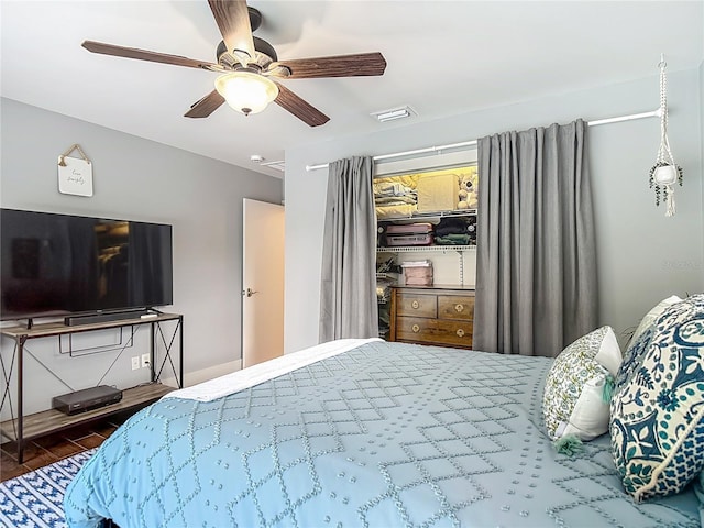 1014 Sylvia Ln, Tampa, FL 33613 - bedroom with wood finished floors and a ceiling fan