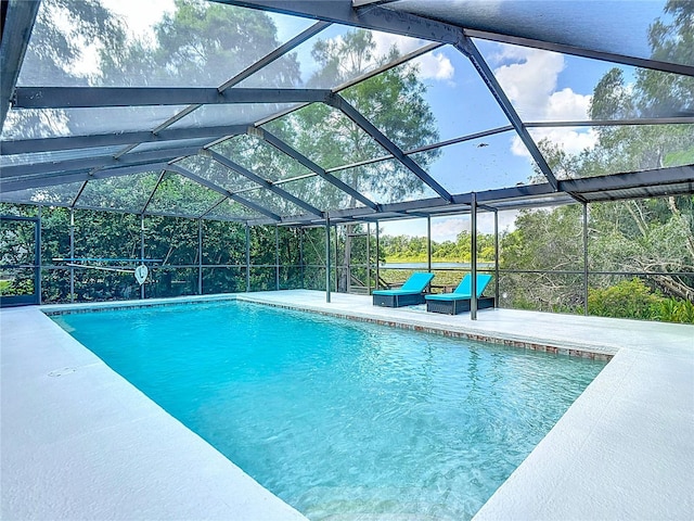 1014 Sylvia Ln, Tampa, FL 33613 - swimming pool with a patio area and a lanai