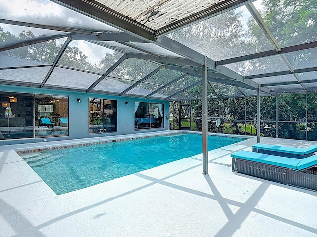 1014 Sylvia Ln, Tampa, FL 33613 - outdoor pool featuring a patio and a lanai