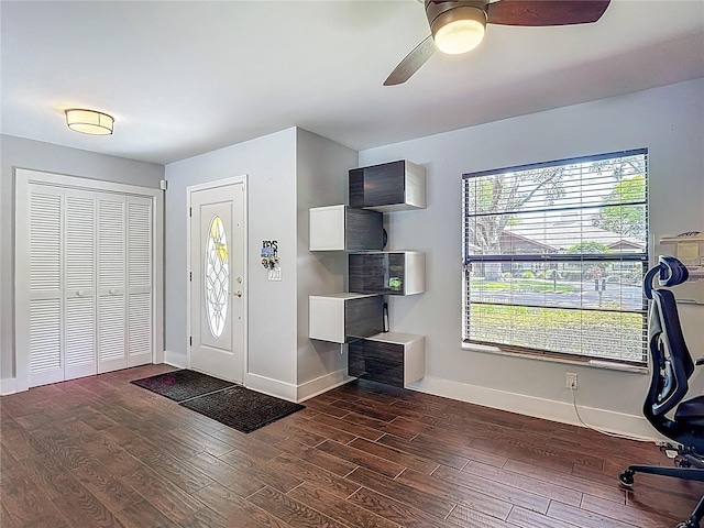 1014 Sylvia Ln, Tampa, FL 33613 - foyer entrance with dark wood-style floors and ceiling fan