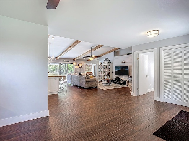 1014 Sylvia Ln, Tampa, FL 33613 - living room with a ceiling fan and dark wood-type flooring