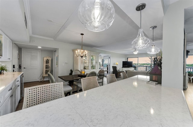 2700 Bayshore Blvd Unit 11405, Dunedin, FL 34698 - dining room featuring a chandelier and a ceiling fan