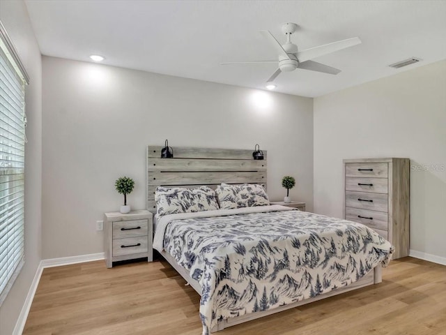 12428 Chaya Ct, Spring Hill, FL 34610 - bedroom featuring light wood-style floors, baseboards, a ceiling fan, and recessed lighting