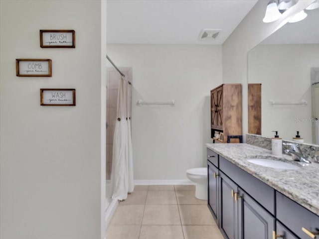 12428 Chaya Ct, Spring Hill, FL 34610 - bathroom featuring toilet, vanity, curtained shower, and tile patterned floors