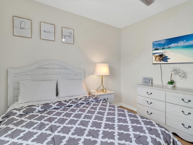 12428 Chaya Ct, Spring Hill, FL 34610 - bedroom featuring baseboards
