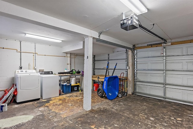 1211 14th St N, Saint Petersburg, FL 33705 - garage with a garage door opener and washing machine and dryer