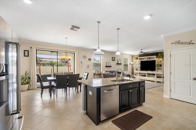 11802 Twilight Darner Pl, Riverview, FL 33569 - kitchen with a sink, stainless steel appliances, a textured ceiling, light stone counters, and light tile patterned flooring