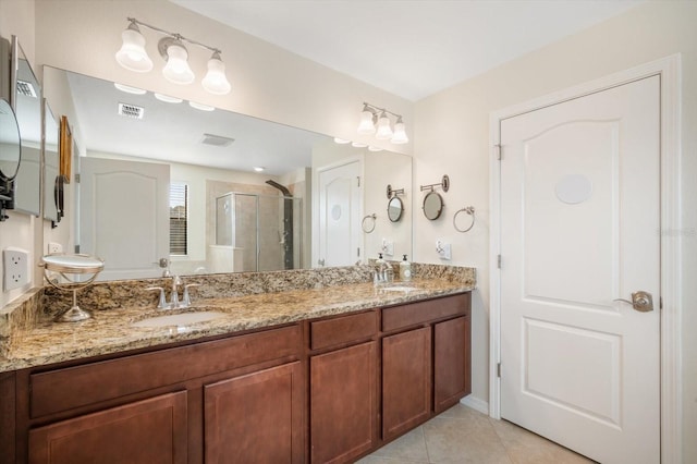 11802 Twilight Darner Pl, Riverview, FL 33569 - full bathroom with a shower stall, double vanity, and tile patterned flooring