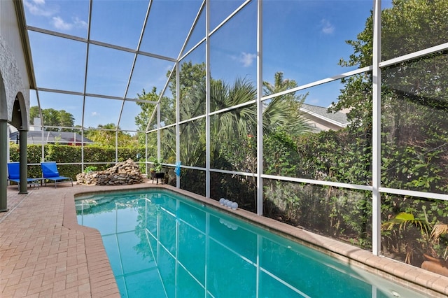 892 Crestridge Cir, Tarpon Springs, FL 34688 - outdoor pool with a patio and a lanai