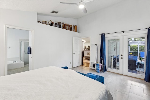 892 Crestridge Cir, Tarpon Springs, FL 34688 - tiled bedroom featuring access to exterior, french doors, a ceiling fan, connected bathroom, and high vaulted ceiling