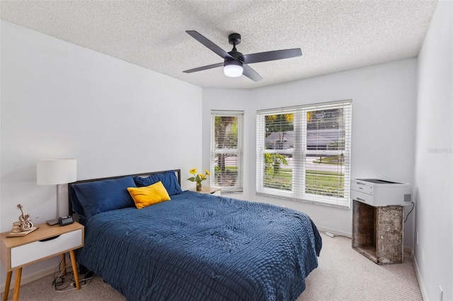 892 Crestridge Cir, Tarpon Springs, FL 34688 - bedroom featuring carpet flooring, baseboards, a textured ceiling, and ceiling fan