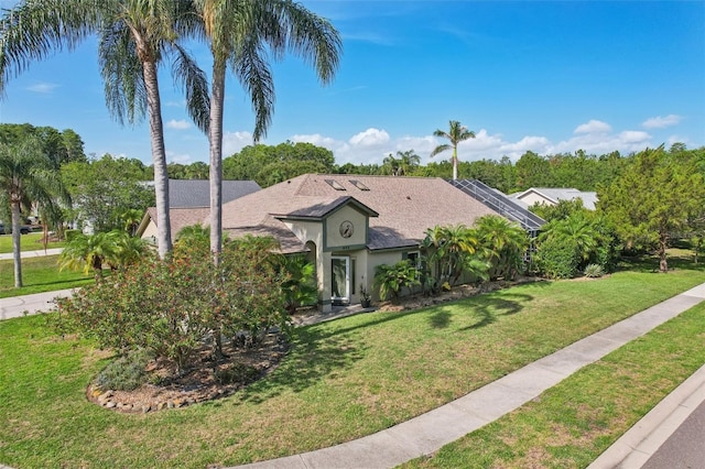 892 Crestridge Cir, Tarpon Springs, FL 34688 - view of front of home with stucco siding and a front lawn