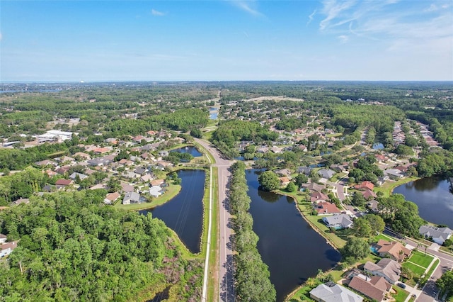 892 Crestridge Cir, Tarpon Springs, FL 34688 - aerial overview of property's location with a large body of water and nearby suburban area