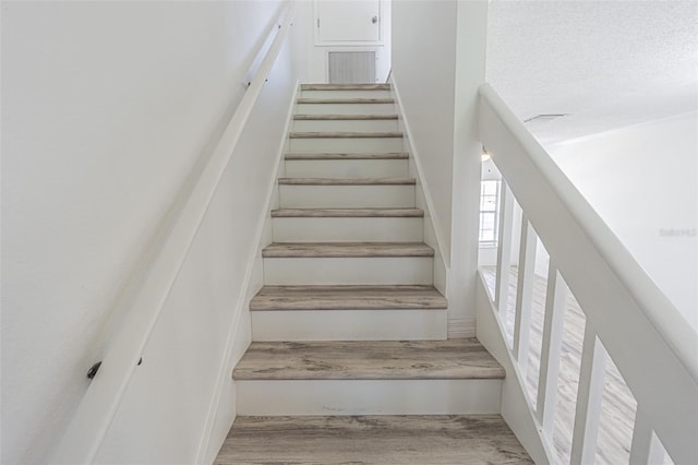6229 Bayside Key Dr, Tampa, FL 33615 - stairway with wood finished floors