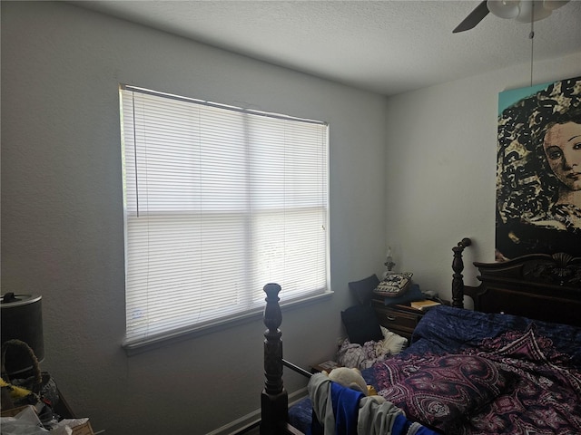 7187 53rd St N, Pinellas Park, FL 33781 - bedroom with a ceiling fan and a textured ceiling