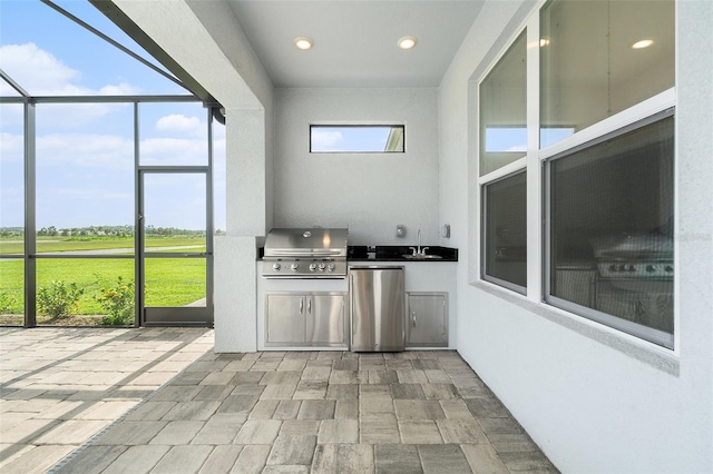 33774 Castaway Loop, Wesley Chapel, FL 33543 - view of patio / terrace featuring a sink and glass enclosure