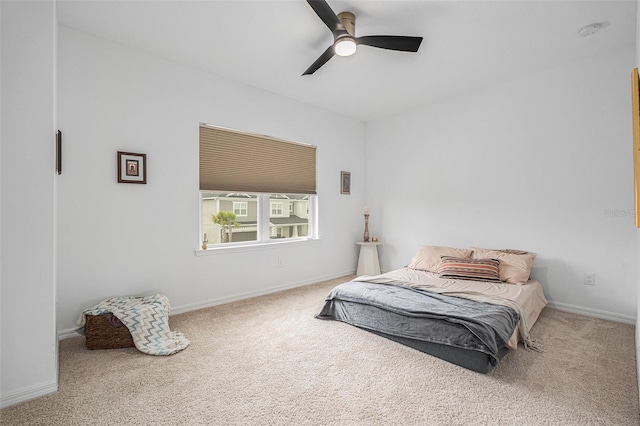33774 Castaway Loop, Wesley Chapel, FL 33543 - carpeted bedroom featuring baseboards and a ceiling fan