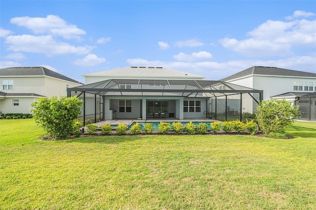 33774 Castaway Loop, Wesley Chapel, FL 33543 - back of property featuring a patio, a yard, a lanai, and a pool