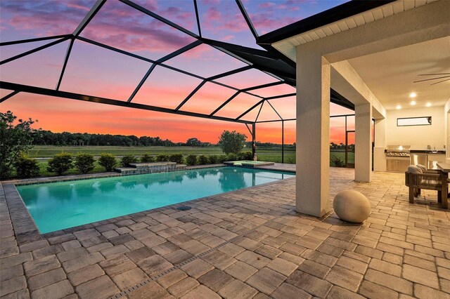 33774 Castaway Loop, Wesley Chapel, FL 33543 - view of swimming pool featuring a patio area, a ceiling fan, a lanai, and a pool with connected hot tub