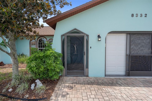 8332 Berkeley Manor Blvd, Spring Hill, FL 34606 - property entrance with stucco siding
