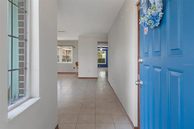 8332 Berkeley Manor Blvd, Spring Hill, FL 34606 - tiled entrance foyer featuring baseboards
