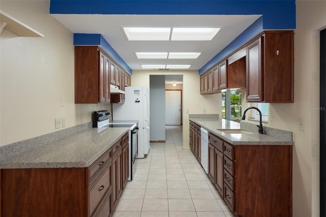 8332 Berkeley Manor Blvd, Spring Hill, FL 34606 - kitchen with electric range oven, under cabinet range hood, a sink, white dishwasher, and light tile patterned flooring