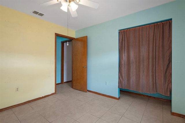 8332 Berkeley Manor Blvd, Spring Hill, FL 34606 - empty room featuring ceiling fan, baseboards, and light tile patterned floors