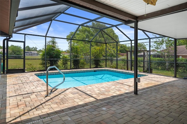 8332 Berkeley Manor Blvd, Spring Hill, FL 34606 - outdoor pool with a patio and glass enclosure