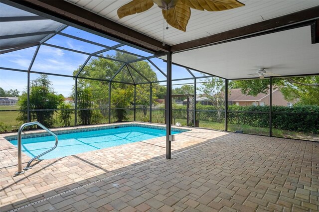 8332 Berkeley Manor Blvd, Spring Hill, FL 34606 - outdoor pool with a ceiling fan, a patio area, and glass enclosure