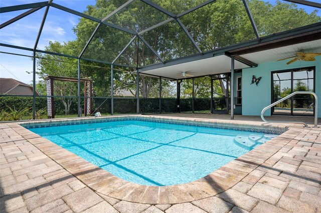 8332 Berkeley Manor Blvd, Spring Hill, FL 34606 - swimming pool with ceiling fan, a patio, a sink, and glass enclosure