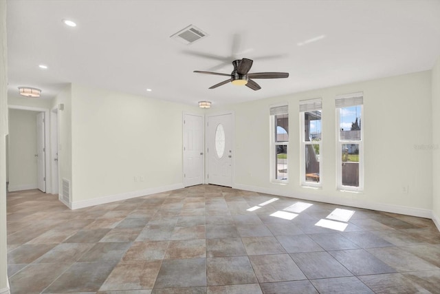 13926 Darlene Ave, Hudson, FL 34667 - spare room with a ceiling fan, baseboards, and recessed lighting
