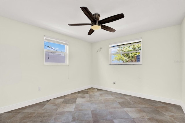 13926 Darlene Ave, Hudson, FL 34667 - unfurnished room with ceiling fan and baseboards