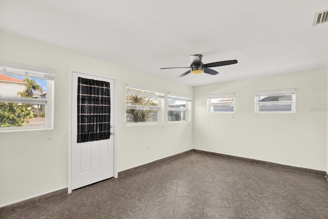 13926 Darlene Ave, Hudson, FL 34667 - empty room featuring ceiling fan and baseboards