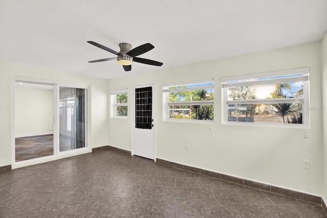 13926 Darlene Ave, Hudson, FL 34667 - spare room with baseboards and a ceiling fan