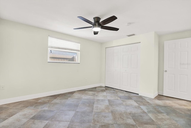 13926 Darlene Ave, Hudson, FL 34667 - unfurnished bedroom with baseboards, a closet, and ceiling fan