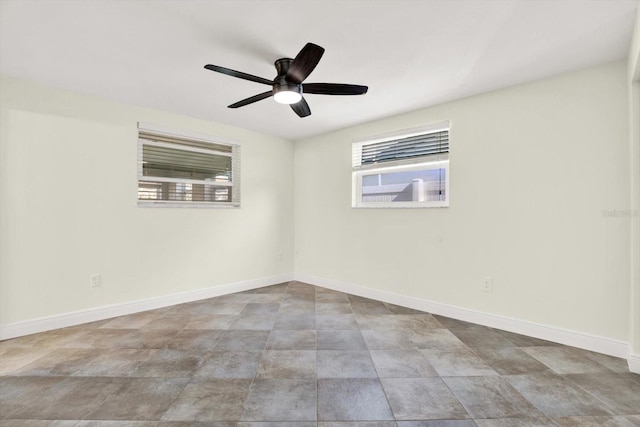 13926 Darlene Ave, Hudson, FL 34667 - empty room featuring a ceiling fan and baseboards