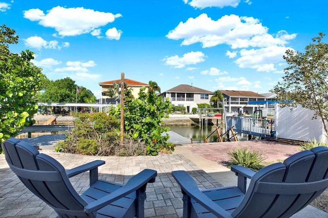 13926 Darlene Ave, Hudson, FL 34667 - view of patio / terrace featuring a water view, boat lift, and a dock