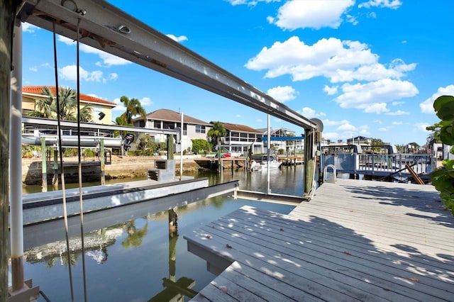 13926 Darlene Ave, Hudson, FL 34667 - dock area featuring boat lift and a water view