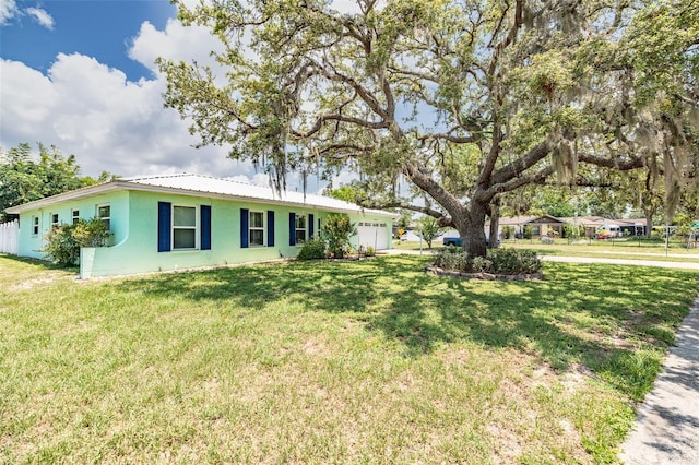 1022 Greenbriar Dr, Brandon, FL 33511 - ranch-style house with an attached garage, stucco siding, and a front yard