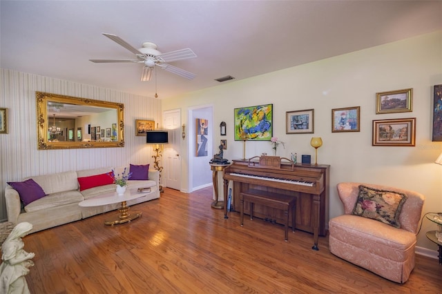 1022 Greenbriar Dr, Brandon, FL 33511 - living area with baseboards, wood finished floors, and a ceiling fan