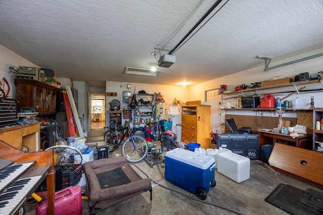 1468 Wigmore St SE, Palm Bay, FL 32909 - garage featuring a garage door opener and a workshop area
