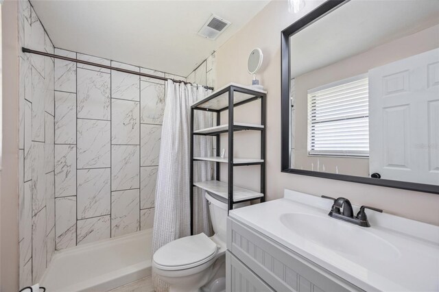 3217 Mott Rd, Dover, FL 33527 - full bath with toilet, vanity, and a tile shower