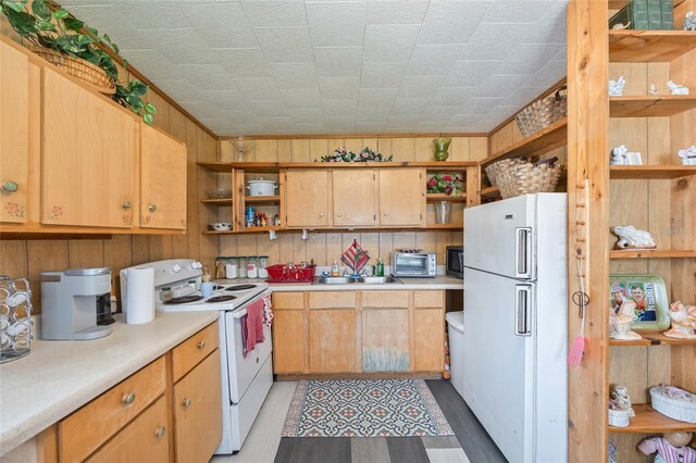 3217 Mott Rd, Dover, FL 33527 - kitchen featuring open shelves, white appliances, light countertops, a sink, and light wood-type flooring