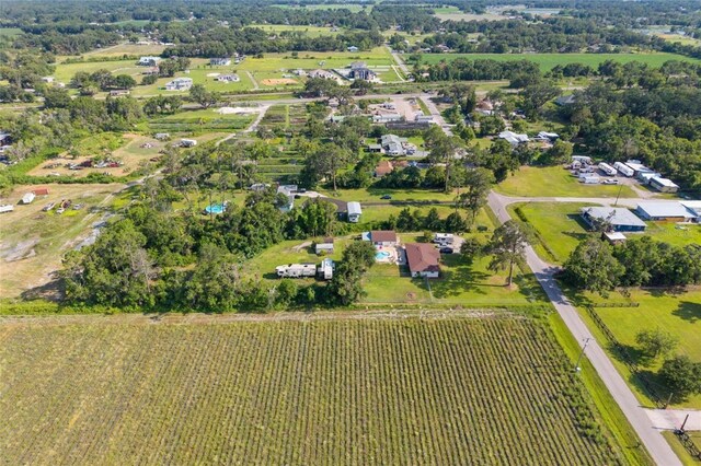 3217 Mott Rd, Dover, FL 33527 - aerial view of property's location featuring rows of crops and rural landscape