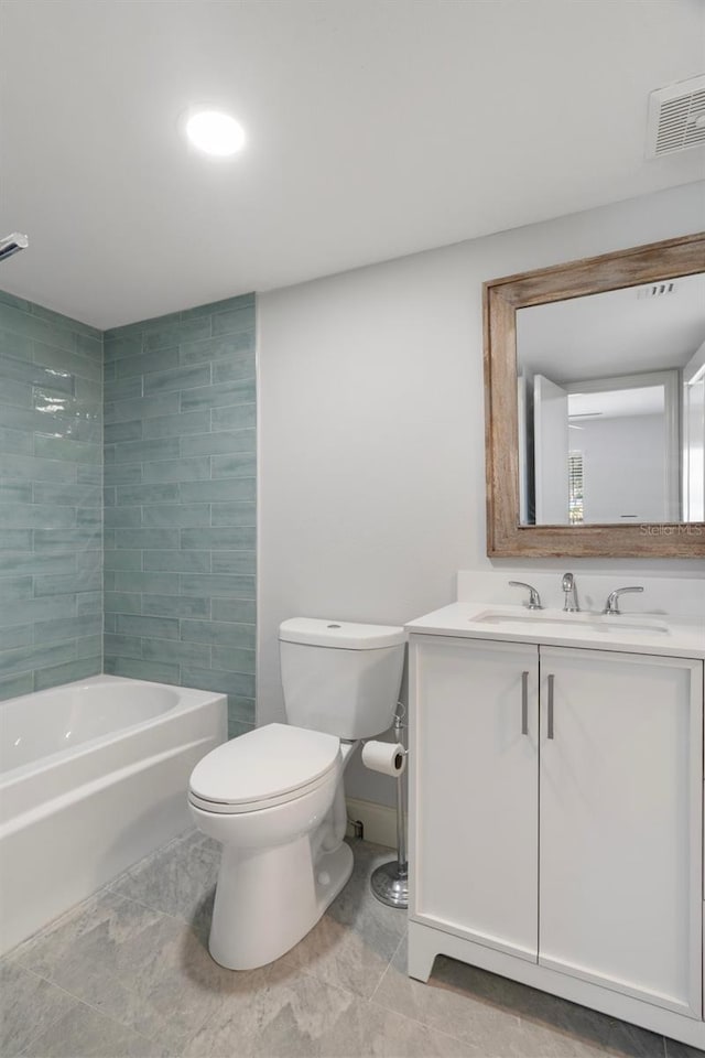 500 New York Ave Unit 23, Dunedin, FL 34698 - bathroom featuring toilet, vanity, and shower / bathtub combination