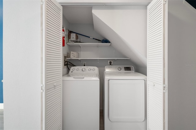 500 New York Ave Unit 23, Dunedin, FL 34698 - laundry area featuring washer and clothes dryer