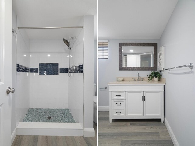 500 New York Ave Unit 23, Dunedin, FL 34698 - full bathroom featuring wood finished floors, vanity, toilet, a tile shower, and baseboards